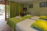 Tobago - Shepherd`s Inn, Zimmerbeispiel Gartenseite/Pasture Room